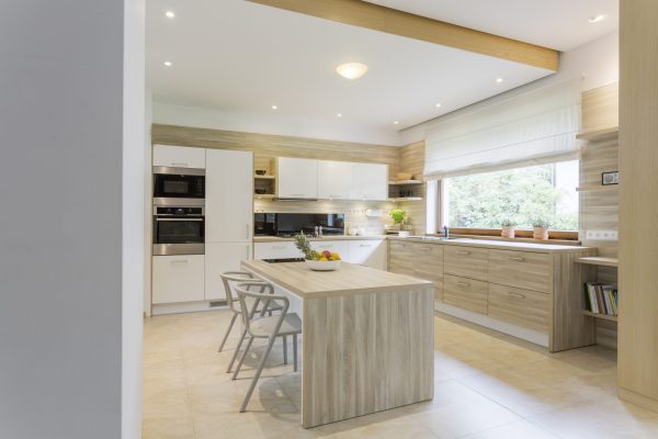 Kitchen in light colours and white furniture